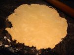 The pie crust rolled out