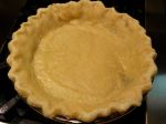 The partially cooked pie crust