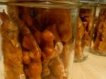 The peanut brittle broken in pieces and placed in jars